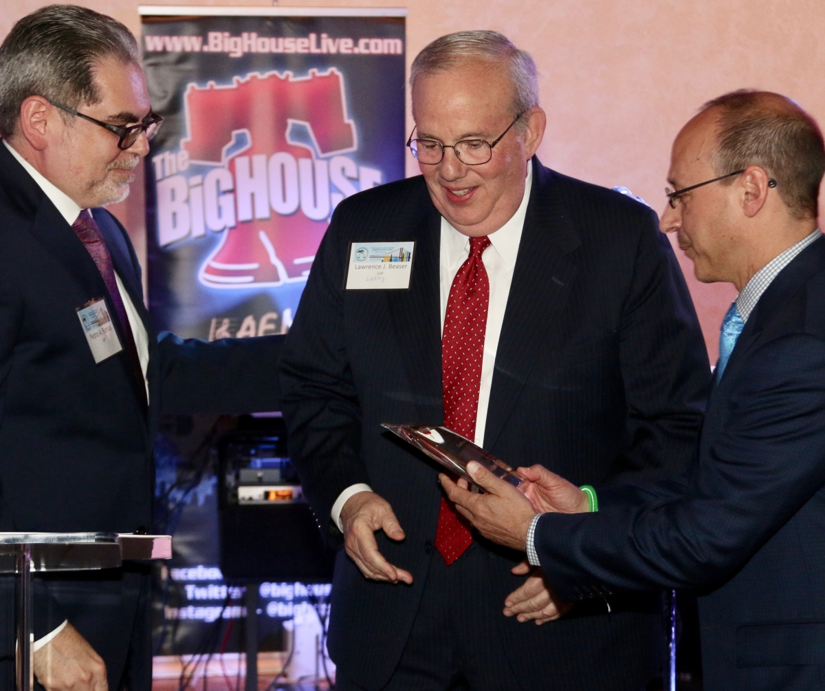 Lawrence J. Beaser receiving the Pollak Award at the 2016 Access to Justice Benefit.