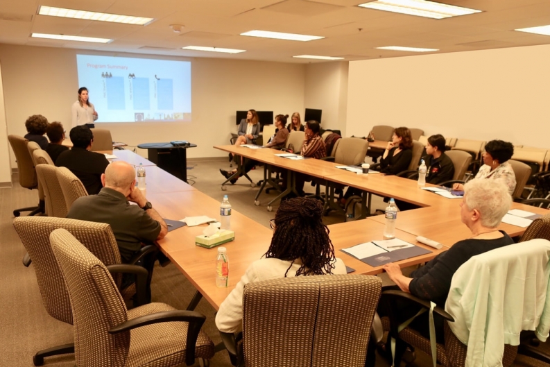 People sitting around a conference room