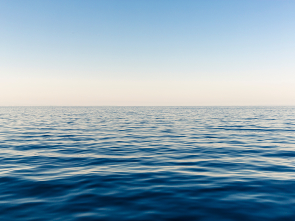 A large body of water and sky