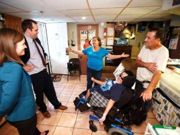 LCD Staff visiting with a client