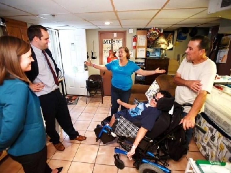 LCD Staff visiting with a client